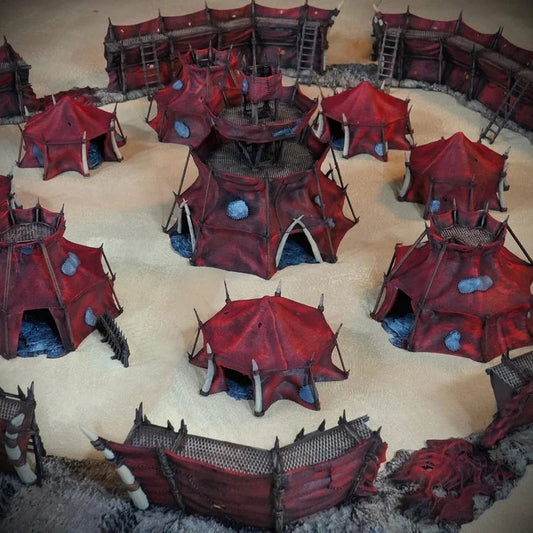 The Nomad Kings - Full Set painted photograph of the encampment from a low angle with its central hut and walls